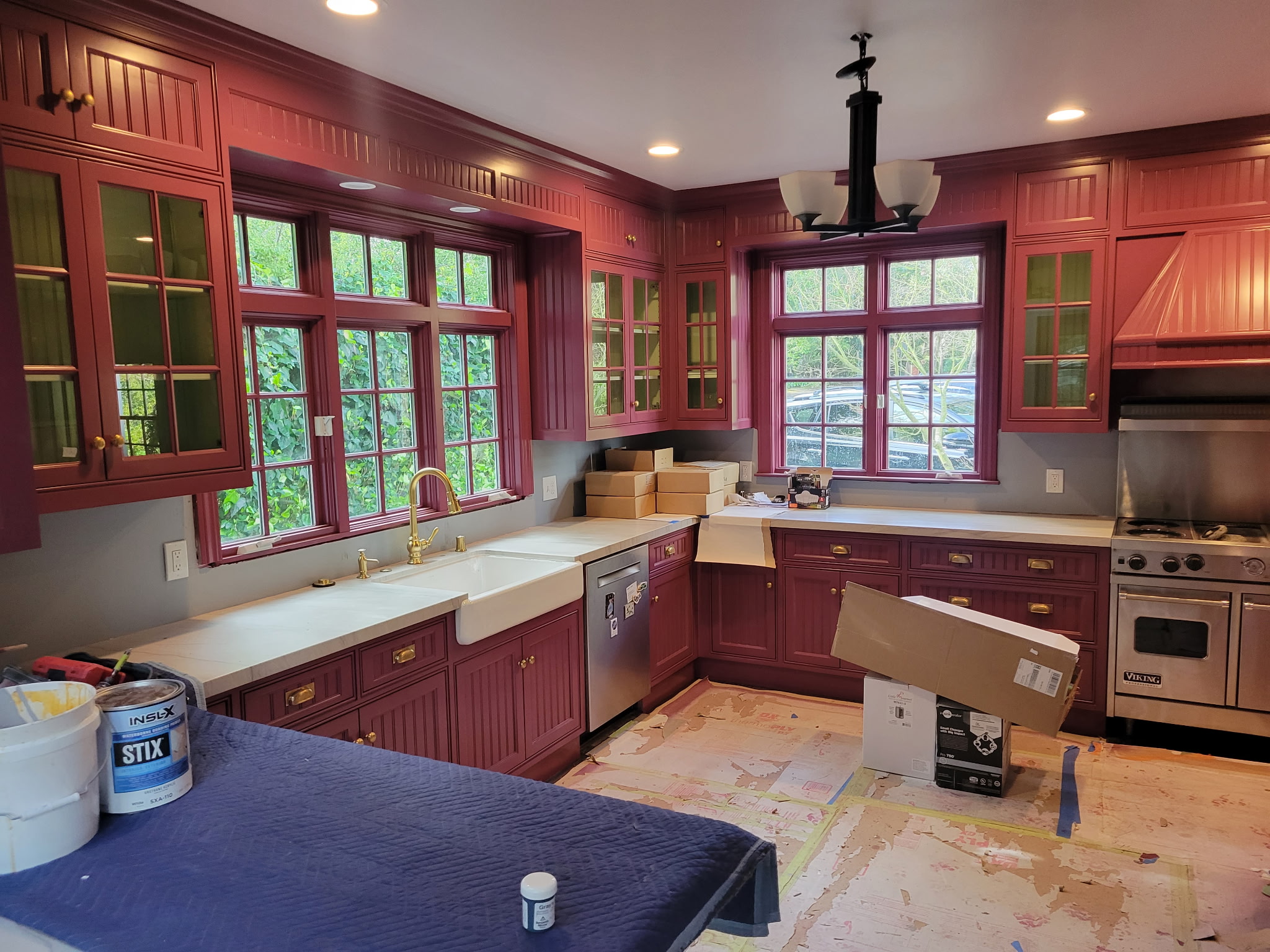 Freshly refinished kitchen cabinets, in-progress